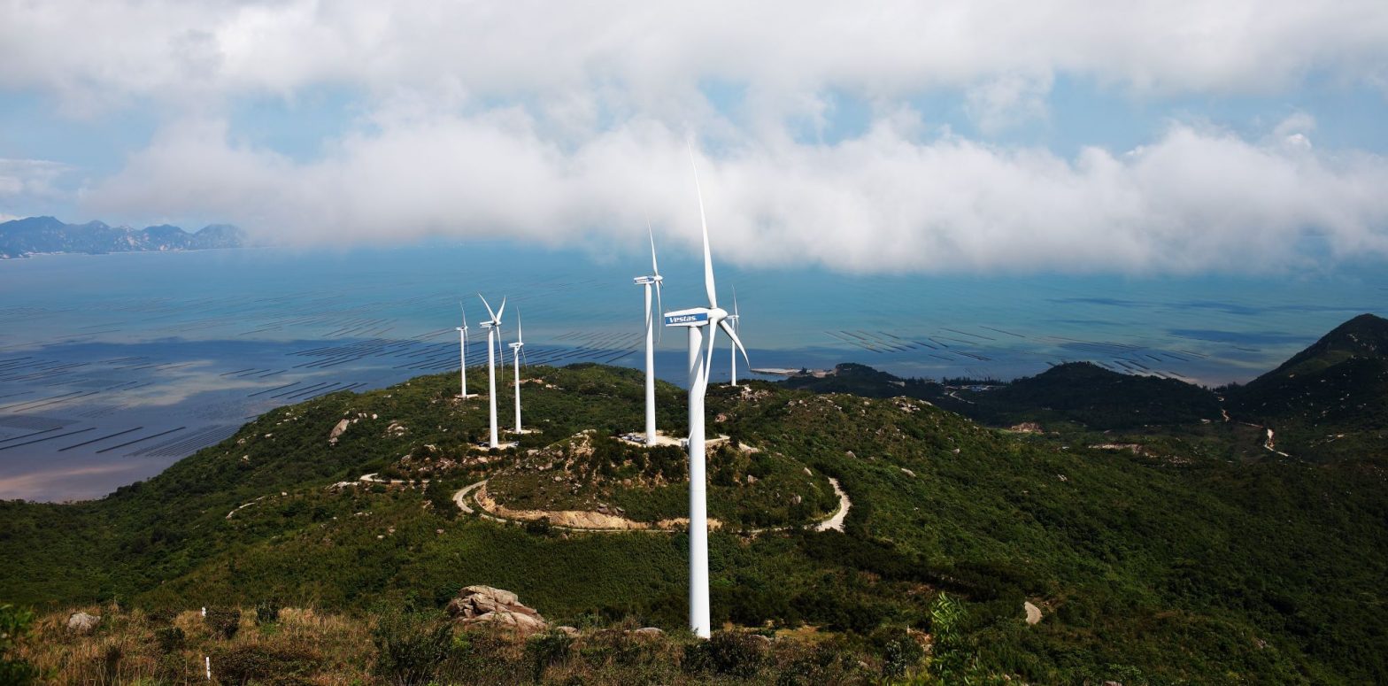 wind-terbines-hilltop-sea-view