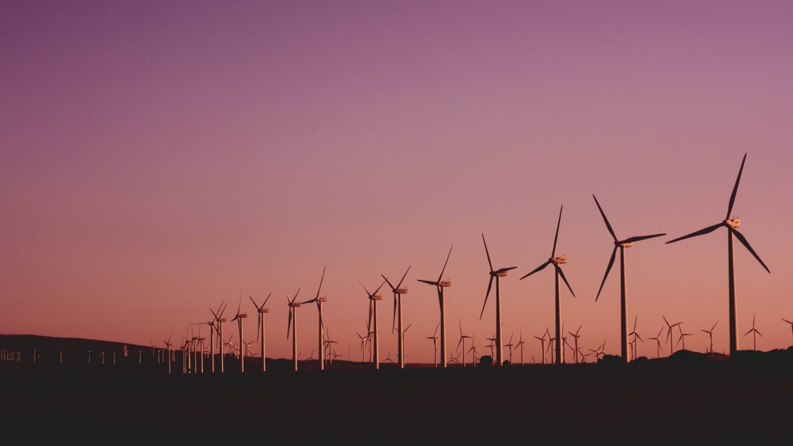 wind-turbines-at-sunset-kansas-skyline